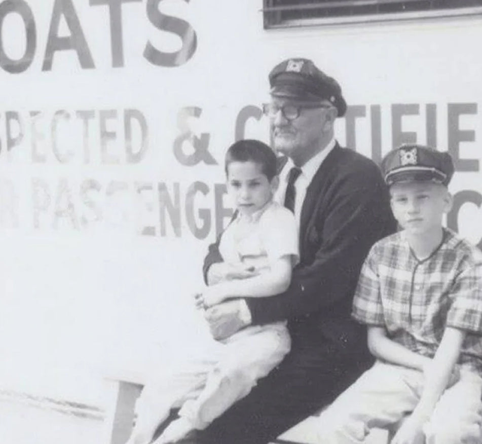 Grandpa carrying his grandchildren